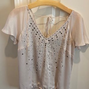 White House Black Market blouse with a flirty flutter sleeve in size small